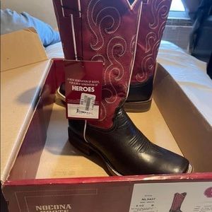 Size 8.5 Cowgirl boots. Never been worn. Paid $189